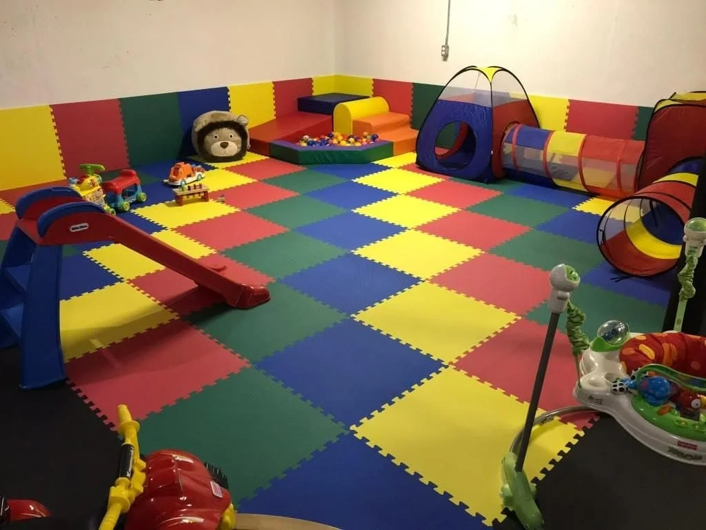 Classroom activity area with colourful mat flooring